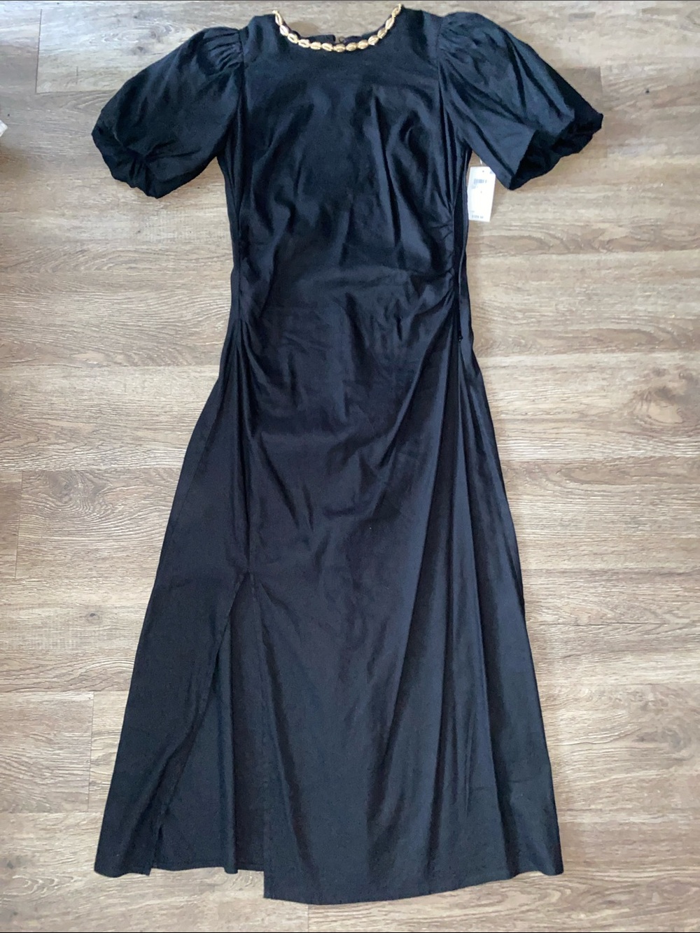 ViVI Black Maxi Dress Puff Sleeves and PUKA Chain Accent-subtle tropical detail